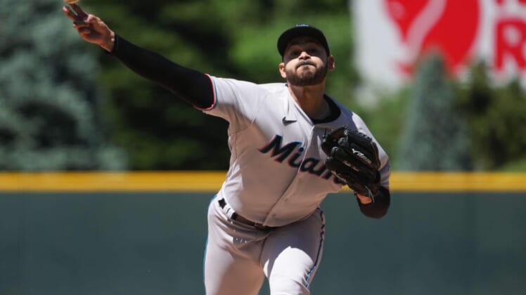 May 30, 2022; Denver, Colorado, USA; Miami Marlins starting pitcher Pablo Lopez (49) throws a pitch in the first inning against the Colorado Rockies at Coors Field. Mandatory Credit: Ron Chenoy-USA TODAY Sports