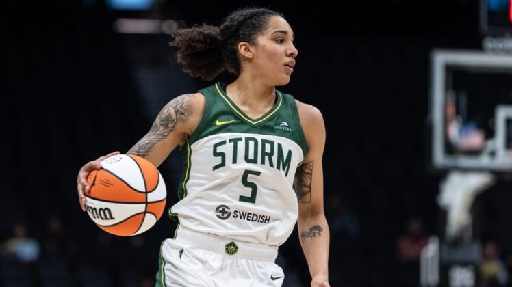 May 29, 2022; Seattle, Washington, USA; Seattle Storm forward Gabby Williams (5) dribbles the ball against the New York Liberty at Climate Pledge Arena. Mandatory Credit: Stephen Brashear-USA TODAY Sports