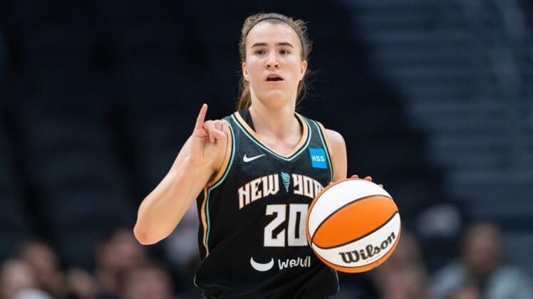May 29, 2022; Seattle, Washington, USA; New York Liberty guard Sabrina Ionescu (20) dribbles the ball against the Seattle Storm at Climate Pledge Arena. Mandatory Credit: Stephen Brashear-USA TODAY Sports
