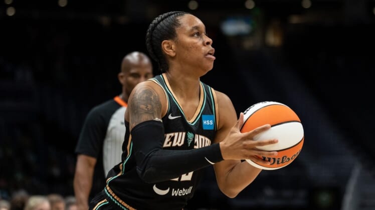 May 29, 2022; Seattle, Washington, USA; New York Liberty guard Asia Durr (25) shoots the ball against the Seattle Storm at Climate Pledge Arena. Mandatory Credit: Stephen Brashear-USA TODAY Sports