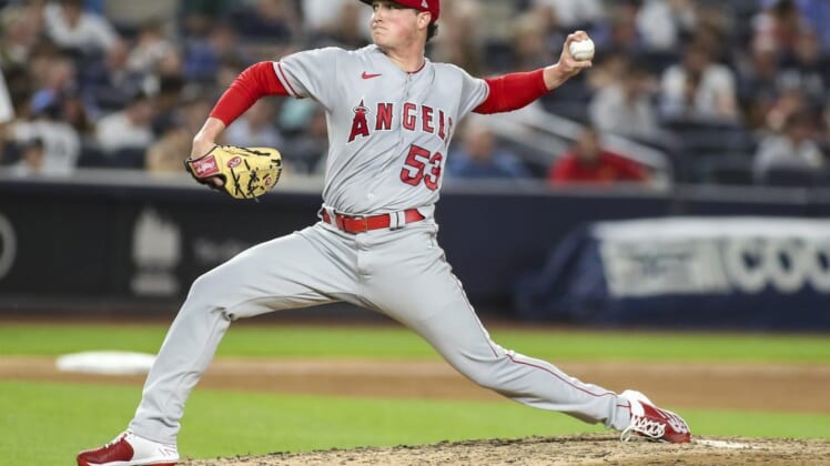 May 31, 2022; Bronx, New York, USA; Los Angeles Angels pitcher Kenny Rosenberg (53) pitches in the fifth inning against the New York Yankees at Yankee Stadium. Mandatory Credit: Wendell Cruz-USA TODAY Sports