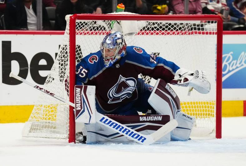 May 31, 2022; Denver, Colorado, USA; Colorado Avalanche goaltender Darcy Kuemper (35) defends the net against the Edmonton Oilers in the first period in game one of the Western Conference Final of the 2022 Stanley Cup Playoffs at Ball Arena. Mandatory Credit: Ron Chenoy-USA TODAY Sports