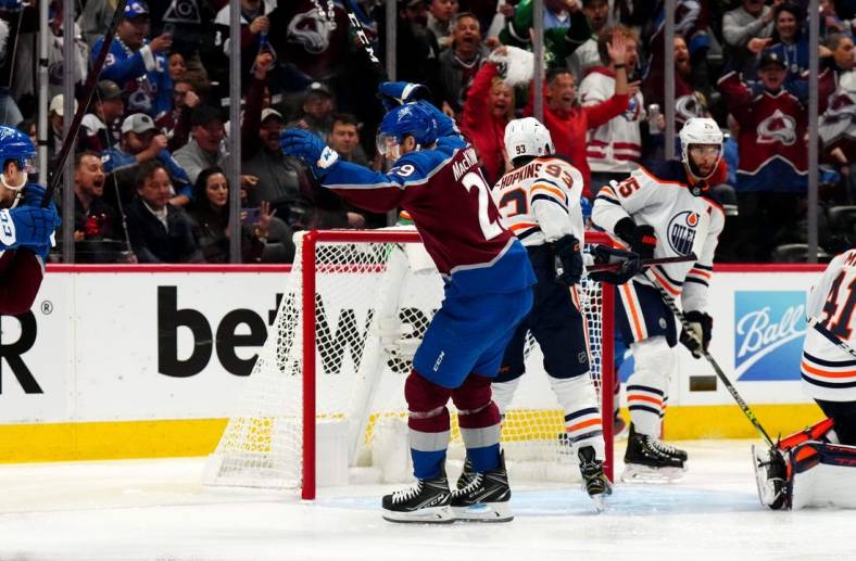 May 31, 2022; Denver, Colorado, USA; Colorado Avalanche center Nathan MacKinnon (29) celebrates a goal in the second period against the Edmonton Oilers in game one of the Western Conference Final of the 2022 Stanley Cup Playoffs at Ball Arena. Mandatory Credit: Ron Chenoy-USA TODAY Sports