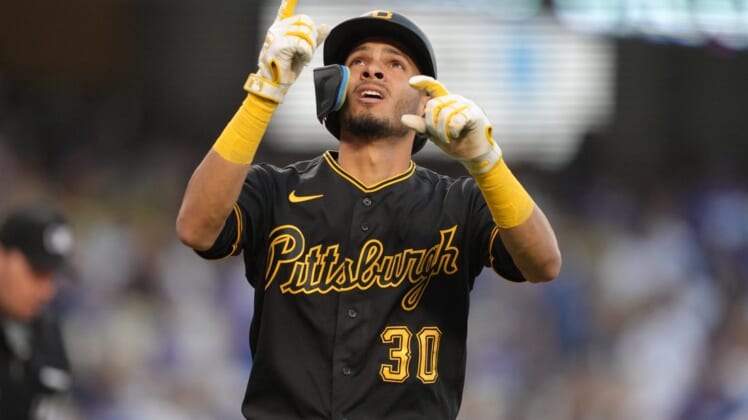 May 31, 2022; Los Angeles, California, USA; Pittsburgh Pirates left fielder Tucupita Marcano (30) celebrates after hitting a two-run home run in the second inning against the Los Angeles Dodgers at Dodger Stadium. Mandatory Credit: Kirby Lee-USA TODAY Sports