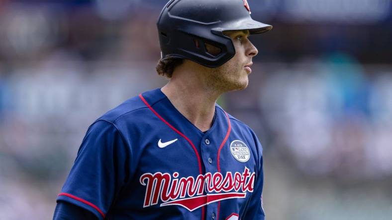 Jun 2, 2022; Detroit, Michigan, USA; Minnesota Twins designated hitter Max Kepler (26) walks back to the dugout after an at bat during the first inning against the Detroit Tigers at Comerica Park. Mandatory Credit: Raj Mehta-USA TODAY Sports