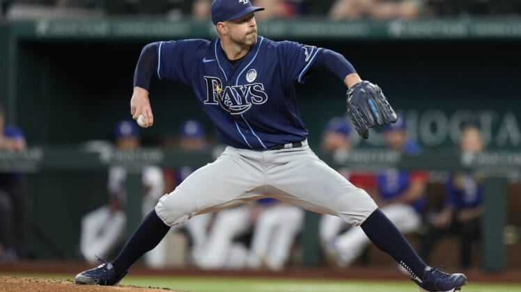 Jun 2, 2022; Arlington, Texas, USA; Tampa Bay Rays starting pitcher Corey Kluber (28) delivers a pitch to the Texas Rangers during the first inning at Globe Life Field. Mandatory Credit: Jim Cowsert-USA TODAY Sports