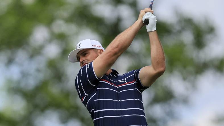 Jun 2, 2022; Dublin, Ohio, USA; Bryson DeChambeau plays his shot from the ninth tee during the first round of the Memorial Tournament. Mandatory Credit: Aaron Doster-USA TODAY Sports