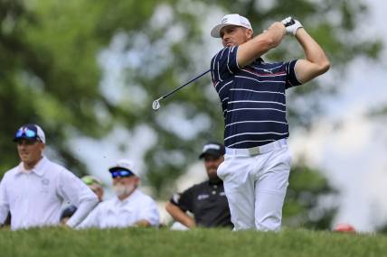 Jun 2, 2022; Dublin, Ohio, USA; Bryson DeChambeau plays his shot from the ninth tee during the first round of the Memorial Tournament. Mandatory Credit: Aaron Doster-USA TODAY Sports