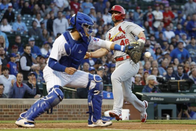 Jun 2, 2022; Chicago, Illinois, USA; St. Louis Cardinals first baseman Paul Goldschmidt (46) runs to score against the Chicago Cubs during the third inning at Wrigley Field. Mandatory Credit: Kamil Krzaczynski-USA TODAY Sports