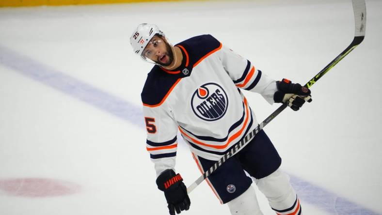 Jun 2, 2022; Denver, Colorado, USA; Edmonton Oilers defenseman Darnell Nurse (25) reacts to missing a shot on the Colorado Avalanche in the second period of game two of the Western Conference Final of the 2022 Stanley Cup Playoffs at Ball Arena. Mandatory Credit: Ron Chenoy-USA TODAY Sports