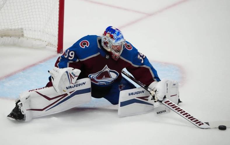 Jun 2, 2022; Denver, Colorado, USA; Colorado Avalanche goaltender Pavel Francouz (39) makes a stick save in the second period against the Edmonton Oilers of game two of the Western Conference Final of the 2022 Stanley Cup Playoffs at Ball Arena. Mandatory Credit: Ron Chenoy-USA TODAY Sports