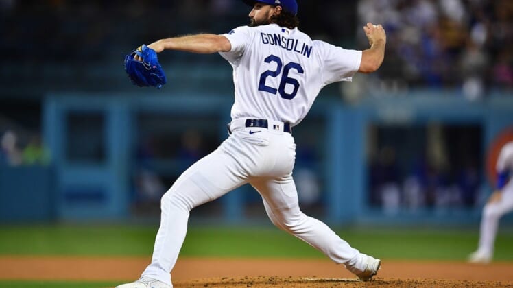 June 2, 2022; Los Angeles, California, USA; Los Angeles Dodgers starting pitcher Tony Gonsolin (26) throws against the New York Mets during the fourth inning at Dodger Stadium. Mandatory Credit: Gary A. Vasquez-USA TODAY Sports