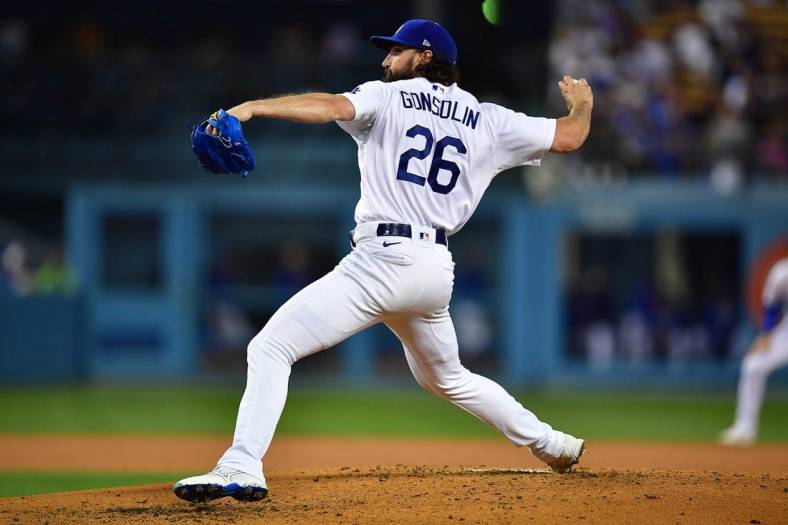 June 2, 2022; Los Angeles, California, USA; Los Angeles Dodgers starting pitcher Tony Gonsolin (26) throws against the New York Mets during the fourth inning at Dodger Stadium. Mandatory Credit: Gary A. Vasquez-USA TODAY Sports