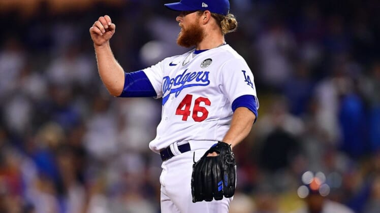 June 2, 2022; Los Angeles, California, USA; Los Angeles Dodgers relief pitcher Craig Kimbrel (46) celebrates the victory against the New York Mets at Dodger Stadium. Mandatory Credit: Gary A. Vasquez-USA TODAY Sports