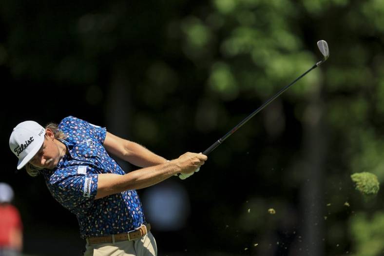 Jun 3, 2022; Dublin, Ohio, USA; Cameron Smith plays his shot from the ninth fairway during the second round of the Memorial Tournament. Mandatory Credit: Aaron Doster-USA TODAY Sports