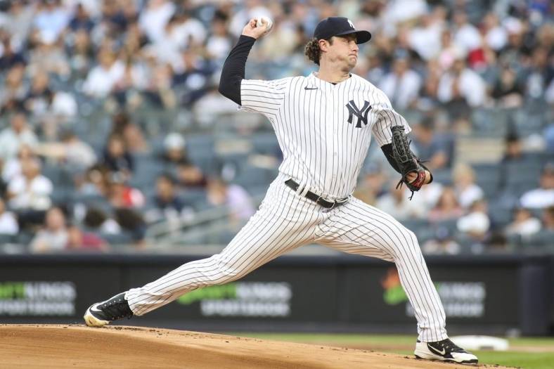 Jun 3, 2022; Bronx, New York, USA;  New York Yankees starting pitcher Gerrit Cole (45) pitches in the first inning against the Detroit Tigers at Yankee Stadium. Mandatory Credit: Wendell Cruz-USA TODAY Sports