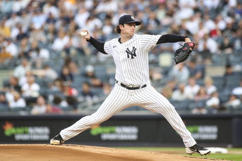 Jun 3, 2022; Bronx, New York, USA;  New York Yankees starting pitcher Gerrit Cole (45) pitches in the first inning against the Detroit Tigers at Yankee Stadium. Mandatory Credit: Wendell Cruz-USA TODAY Sports