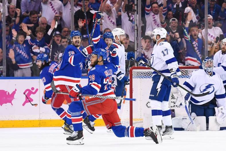 Jun 3, 2022; New York, New York, USA; New York Rangers defenseman K'Andre Miller (79) celebrates his goal against the Tampa Bay Lightning during the first period in game two of the Eastern Conference Final of the 2022 Stanley Cup Playoffs at Madison Square Garden. Mandatory Credit: Dennis Schneidler-USA TODAY Sports