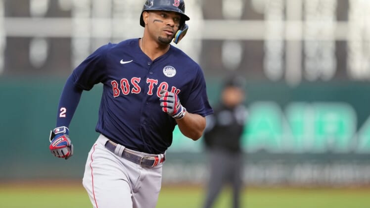 Jun 3, 2022; Oakland, California, USA; Boston Red Sox shortstop Xander Bogaerts (2) rounds the bases after hitting a home run against the Oakland Athletics during the fourth inning at RingCentral Coliseum. Mandatory Credit: Darren Yamashita-USA TODAY Sports