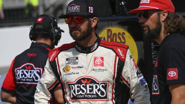 Jun 4, 2022; Madison, Illinois, USA; NASCAR Cup Series driver Martin Truex Jr. (19) looks on during Nascar Cup qualifying at World Wide Technology Raceway at Gateway. Mandatory Credit: Joe Puetz-USA TODAY Sports