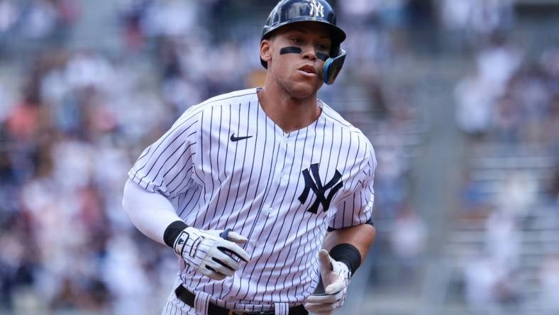 Jun 4, 2022; Bronx, New York, USA; New York Yankees right fielder Aaron Judge (99) runs the bases after hitting a home run against the Detroit Tigers during the first inning at Yankee Stadium. Mandatory Credit: Jessica Alcheh-USA TODAY Sports