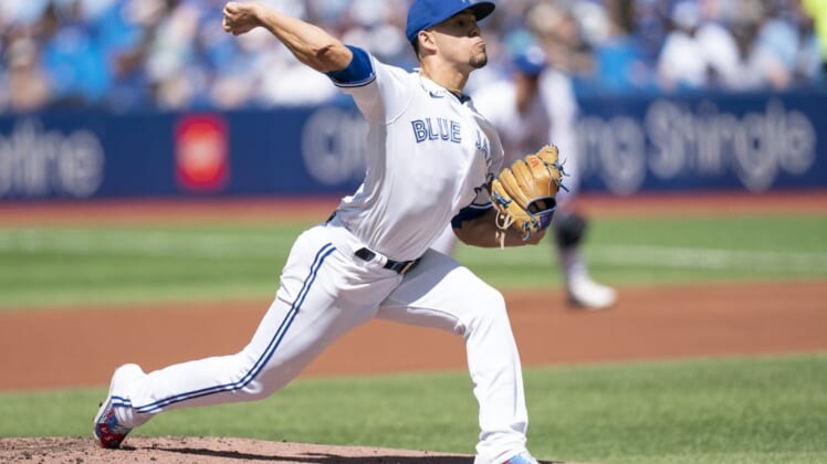 Jun 4, 2022; Toronto, Ontario, CAN; Toronto Blue Jays starting pitcher Jose Berrios (17) throws a pitch against the Minnesota Twins during the first inning at Rogers Centre. Mandatory Credit: Nick Turchiaro-USA TODAY Sports