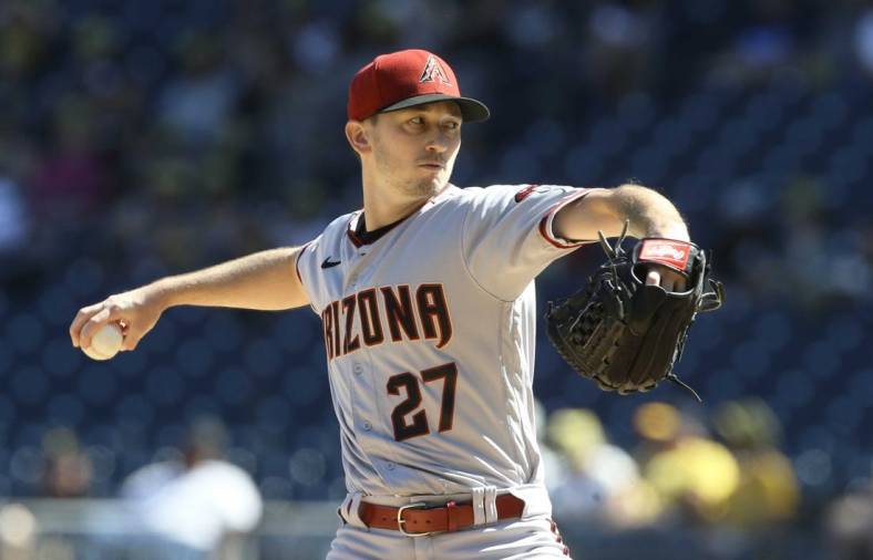 Jun 4, 2022; Pittsburgh, Pennsylvania, USA;  Arizona Diamondbacks starting pitcher Zach Davies (27) delivers pitch against the Pittsburgh Pirates during the first inning at PNC Park. Mandatory Credit: Charles LeClaire-USA TODAY Sports