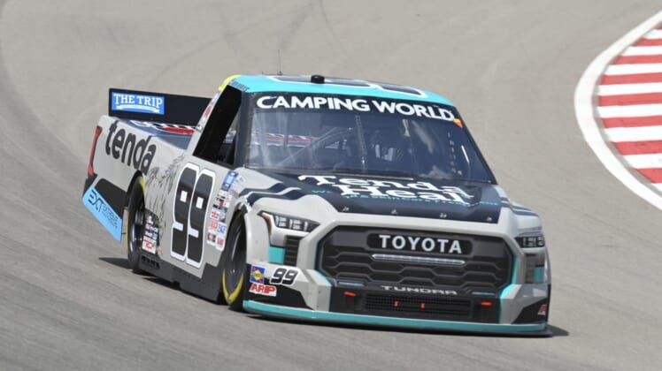 Jun 4, 2022; Madison, Illinois, USA; Camping World Truck Series driver Ben Rhodes (99) races during the 9th Annual Toyota 200 at World Wide Technology Raceway at Gateway. Mandatory Credit: Joe Puetz-USA TODAY Sports