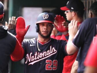 Jun 4, 2022; Cincinnati, Ohio, USA; Washington Nationals left fielder Yadiel Hernandez (29) is greeted after scoring against the Cincinnati Reds during the fourth inning at Great American Ball Park. Mandatory Credit: David Kohl-USA TODAY Sports