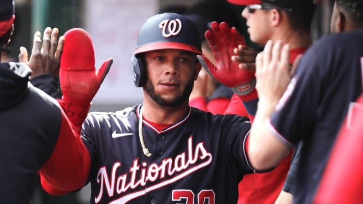 Jun 4, 2022; Cincinnati, Ohio, USA; Washington Nationals left fielder Yadiel Hernandez (29) is greeted after scoring against the Cincinnati Reds during the fourth inning at Great American Ball Park. Mandatory Credit: David Kohl-USA TODAY Sports