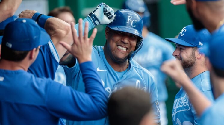 Jun 4, 2022; Kansas City, Missouri, USA; Kansas City Royals catcher Salvador Perez (13) celebrates in the dugout after hitting a home run against the Houston Astros during the sixth inning at Kauffman Stadium. Mandatory Credit: William Purnell-USA TODAY Sports