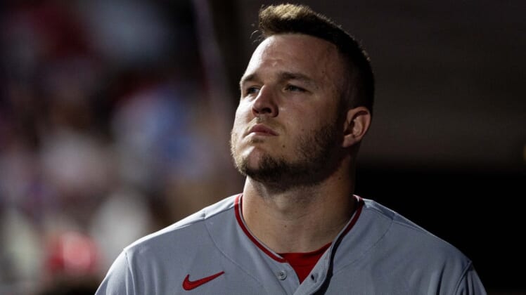 Jun 4, 2022; Philadelphia, Pennsylvania, USA; Los Angeles Angels center fielder Mike Trout (27) looks on from inside the dugout during the fifth inning against the Philadelphia Phillies at Citizens Bank Park. Mandatory Credit: Bill Streicher-USA TODAY Sports