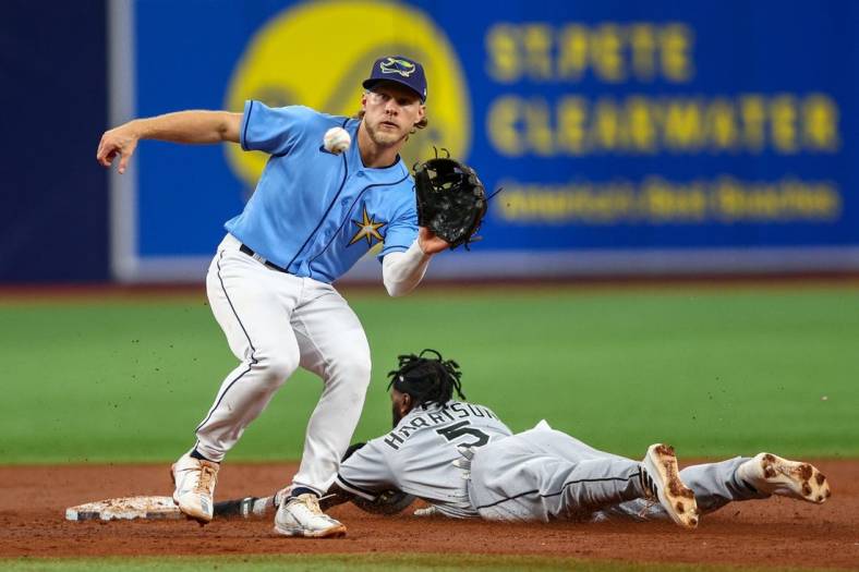 Jun 5, 2022; St. Petersburg, Florida, USA;  Chicago White Sox second baseman Josh Harrison (5) steals second base against the Tampa Bay Rays in the third inning at Tropicana Field. Mandatory Credit: Nathan Ray Seebeck-USA TODAY Sports
