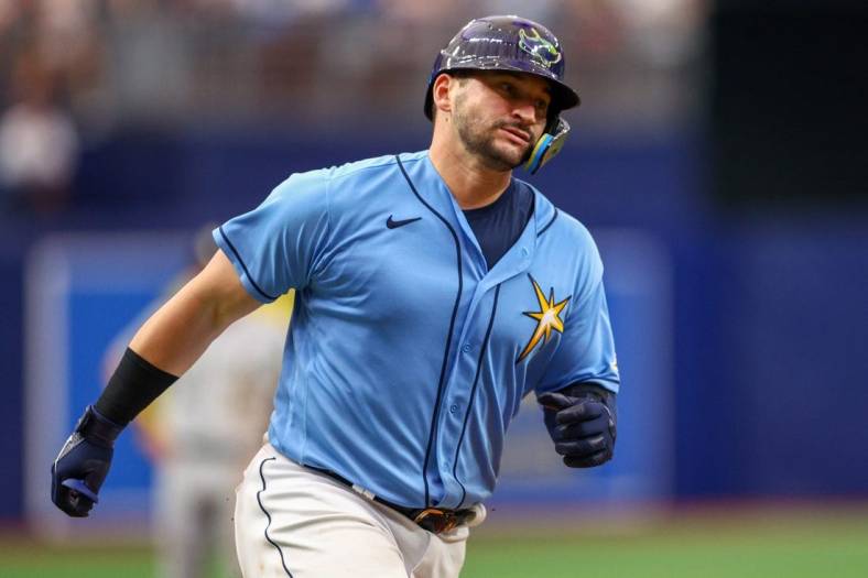 Jun 5, 2022; St. Petersburg, Florida, USA;  Tampa Bay Rays catcher Mike Zunino (10) rounds third base after hitting a two-run home run against the Chicago White Sox in the sixth inning at Tropicana Field. Mandatory Credit: Nathan Ray Seebeck-USA TODAY Sports