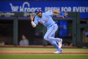 Jun 5, 2022; Arlington, Texas, USA; Texas Rangers second baseman Marcus Semien (2) attempts to steal second base during the eighth inning against the Seattle Mariners at Globe Life Field. Mandatory Credit: Jerome Miron-USA TODAY Sports