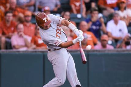 Texas infielder Ivan Melendez (17) hits a ball during the NCAA regional playoff game against Air Force at Disch-Falk Field in Austin, Texas on June 5, 2022.

Aem Texas V Air Force Ncaa G2 5