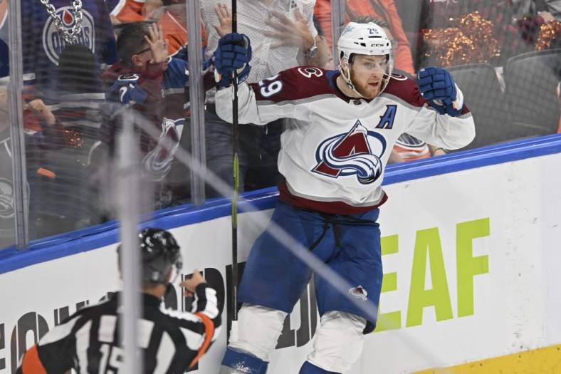 Jun 6, 2022; Edmonton, Alberta, CAN;  Colorado Avalanche forward Nathan MacKinnon (29) celebrates his goal against Edmonton Oilers goaltender Mike Smith (41) (not pictured) during the third period in game four of the Western Conference Final of the 2022 Stanley Cup Playoffs at Rogers Place. Mandatory Credit: Walter Tychnowicz-USA TODAY Sports