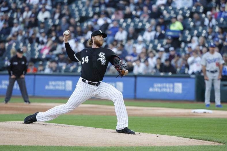 Jun 7, 2022; Chicago, Illinois, USA;  Chicago White Sox starting pitcher Michael Kopech (34) delivers against the Los Angeles Dodgers during the first inning at Guaranteed Rate Field. Mandatory Credit: Kamil Krzaczynski-USA TODAY Sports