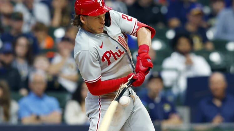 Jun 7, 2022; Milwaukee, Wisconsin, USA;  Philadelphia Phillies third baseman Alec Bohm (28) breaks his bat during the second inning against the Milwaukee Brewers at American Family Field. Mandatory Credit: Jeff Hanisch-USA TODAY Sports