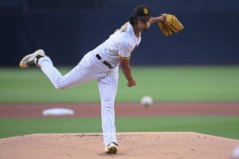 Jun 7, 2022; San Diego, California, USA; San Diego Padres starting pitcher Yu Darvish (11) throws a pitch against the New York Mets during the first inning at Petco Park. Mandatory Credit: Orlando Ramirez-USA TODAY Sports