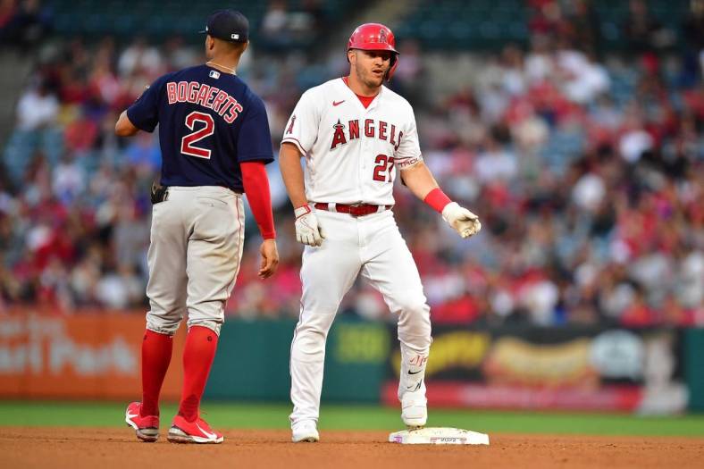 Jun 7, 2022; Anaheim, California, USA; Los Angeles Angels center fielder Mike Trout (27) reaches second on a double hit against the Boston Red Sox during the third inning at Angel Stadium. Mandatory Credit: Gary A. Vasquez-USA TODAY Sports