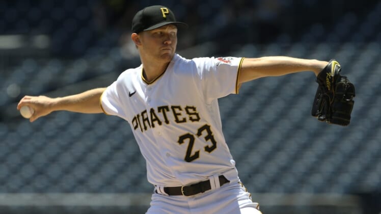 Jun 8, 2022; Pittsburgh, Pennsylvania, USA;  Pittsburgh Pirates starting pitcher Mitch Keller (23) delivers a pitch against the Detroit Tigers during the first inning at PNC Park. Mandatory Credit: Charles LeClaire-USA TODAY Sports