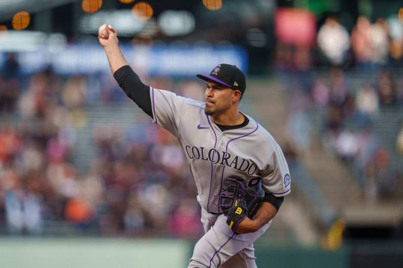 Jun 8, 2022; San Francisco, California, USA;  Colorado Rockies starting pitcher Antonio Senzatela (49) delivers a pitch during the first inning against the San Francisco Giants at Oracle Park. Mandatory Credit: Neville E. Guard-USA TODAY Sports