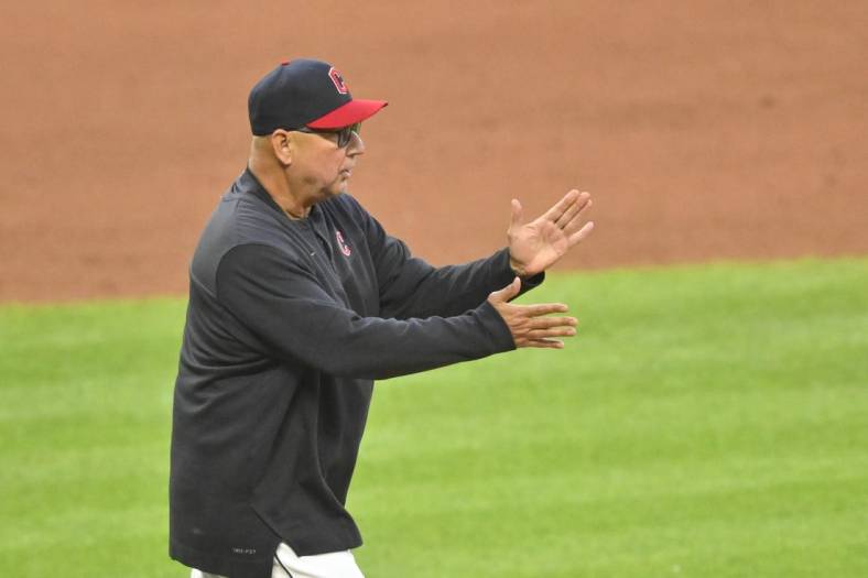 Jun 9, 2022; Cleveland, Ohio, USA; Cleveland Guardians manager Terry Francona (77) walks to the mound during a pitching change in the sixth inning against the Oakland Athletics at Progressive Field. Mandatory Credit: David Richard-USA TODAY Sports