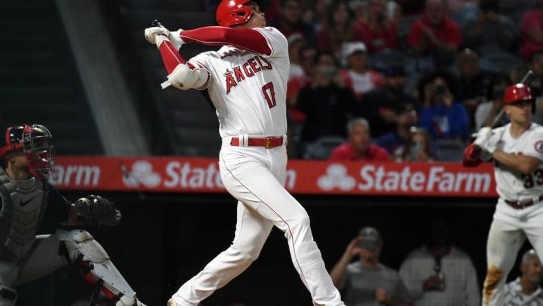 Jun 9, 2022; Anaheim, California, USA; Los Angeles Angels starting pitcher Shohei Ohtani (17) hits a home run in the fifth inning against the Boston Red Sox at Angel Stadium. Mandatory Credit: Richard Mackson-USA TODAY Sports