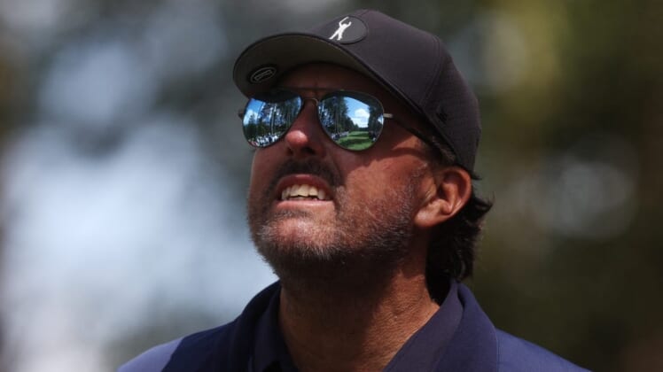 June 10, 2022; St. Albans, UK;  The course is reflected in the sunglasses of Phil Mickelson during the second round of the inaugural LIV golf invitational golf tournament at the Centurion Club. Mandatory Credit: Paul Childs-Action Images/Reuters via USA TODAY Sports