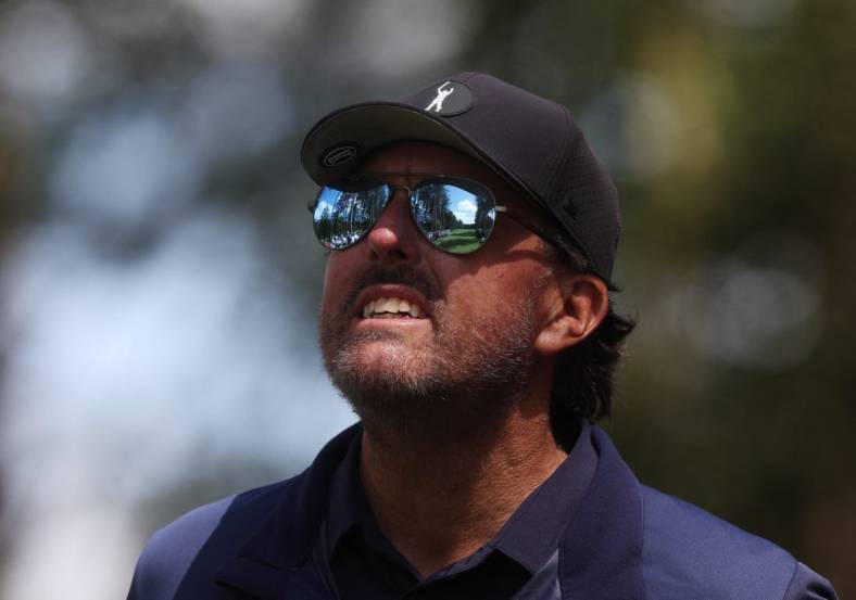 June 10, 2022; St. Albans, UK;  The course is reflected in the sunglasses of Phil Mickelson during the second round of the inaugural LIV golf invitational golf tournament at the Centurion Club. Mandatory Credit: Paul Childs-Action Images/Reuters via USA TODAY Sports