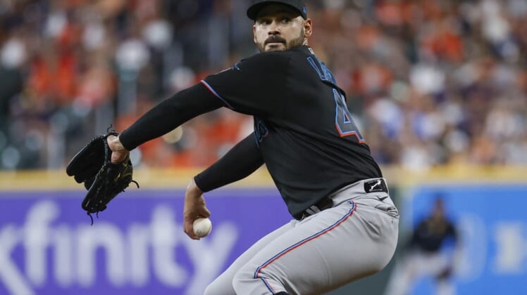Jun 10, 2022; Houston, Texas, USA; Miami Marlins starting pitcher Pablo Lopez (49) delivers a pitch during the second inning against the Houston Astros at Minute Maid Park. Mandatory Credit: Troy Taormina-USA TODAY Sports