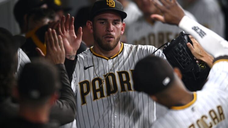Jun 10, 2022; San Diego, California, USA; San Diego Padres starting pitcher Joe Musgrove (44) is greeted in the dugout after pitching the top of the sixth inning against the Colorado Rockies at Petco Park. Mandatory Credit: Orlando Ramirez-USA TODAY Sports