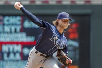 Jun 11, 2022; Minneapolis, Minnesota, USA; Tampa Bay Rays starting pitcher Shane Baz (11) throws to the Minnesota Twins in the first inning at Target Field. Mandatory Credit: Bruce Kluckhohn-USA TODAY Sports